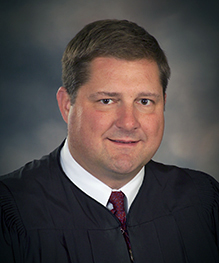 District Judge Robert Burns