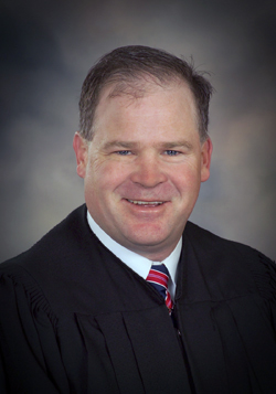 District Judge Daniel Cahill