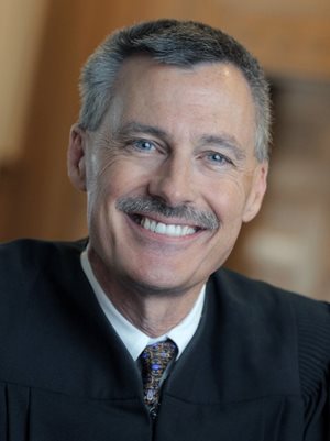 District Judge Thomas Sutherland