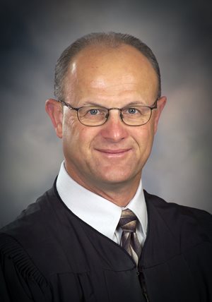 District Judge Warren Wilbert