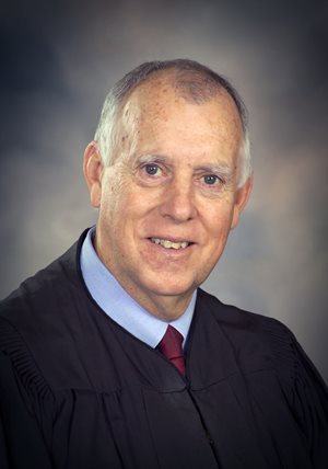 District Judge Robert J. Fleming