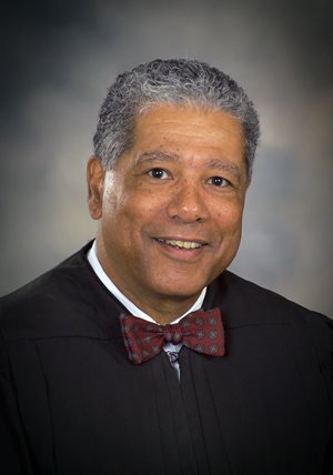 District Judge J. Dexter Burdette