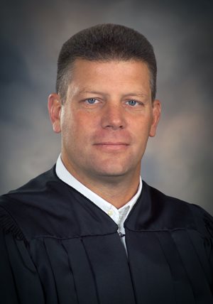 District Magistrate Judge Marty Clark